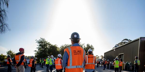 Safety officers and work people in the linear accelerator